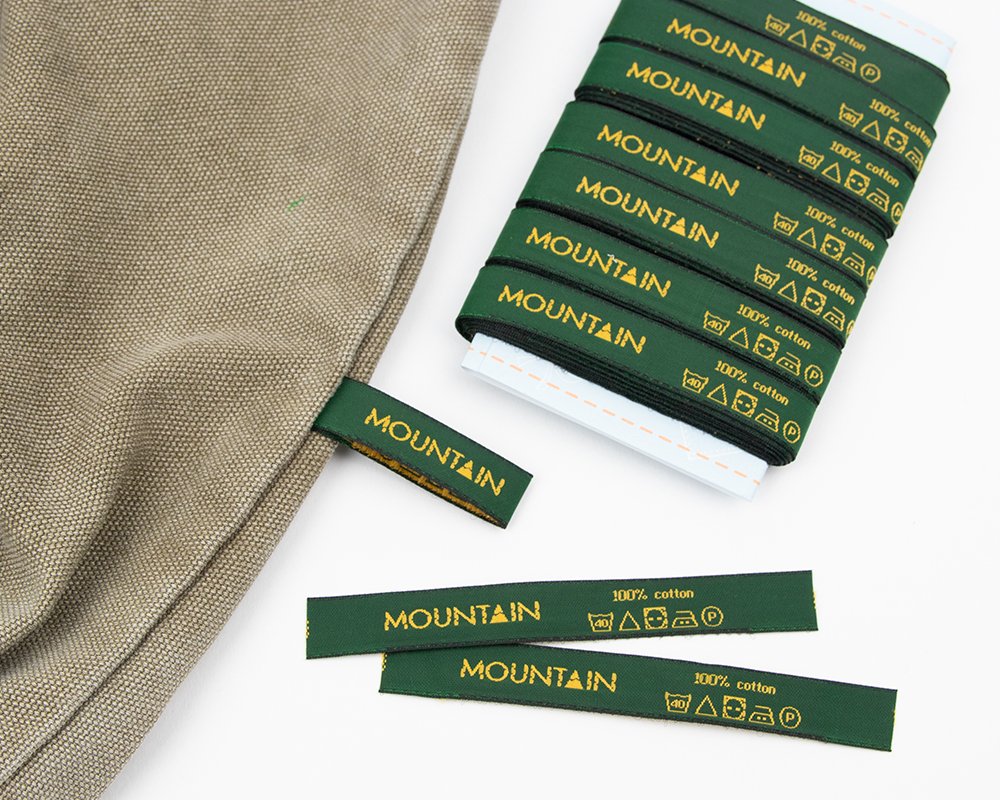 label tissé avec son propre logo